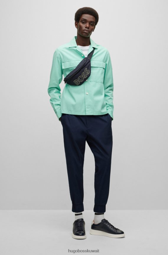 4TFNJN2510 اخضر فاتح Hugo Boss قميص هوغو باللون الأخضر الفاتح بقصّة مريحة مصنوع من مزيج القطن