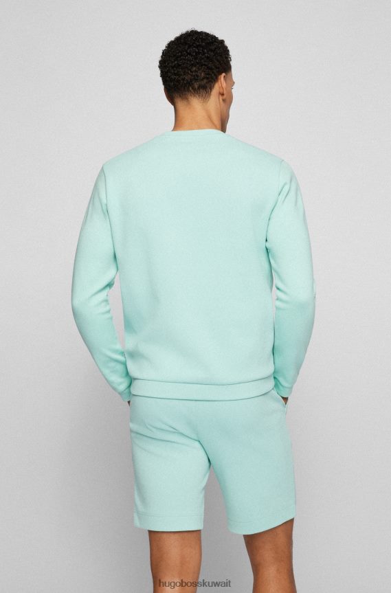 4TFNJN2517 اخضر فاتح Hugo Boss سويت شيرت هوغو برقبة دائرية باللون الأخضر الفاتح من القطن المتشابك مع شعار منحني