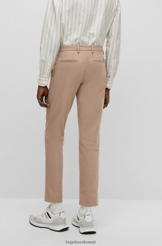 4TFNJN2556 البيج الفاتح Hugo Boss بنطلون هوغو ذو قصة ضيقة باللون البيج الفاتح مع طيات أمامية من مزيج القطن
