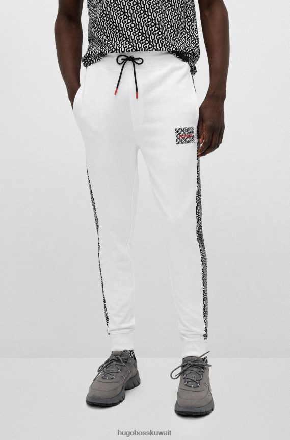 4TFNJN2572 أبيض Hugo Boss بدلة رياضية من قطن تيري مع رقعة شعار وإدخالات باللون الأبيض