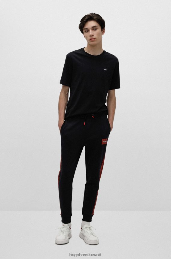4TFNJN2573 أسود Hugo Boss بدلة رياضية سوداء من Hugo مصنوعة من قطن تيري مع رقعة شعار وإدخالات