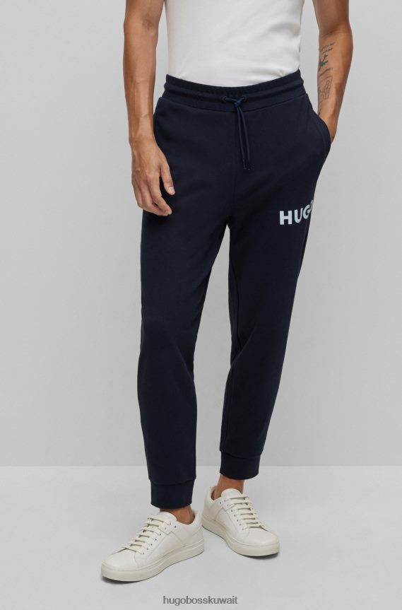 4TFNJN2576 أزرق غامق Hugo Boss بدلة رياضية من قطن تيري مع تفاصيل الشعار باللون الأزرق الداكن