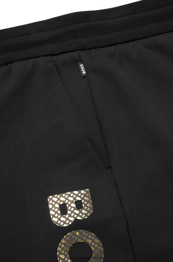 4TFNJN2634 أسود Hugo Boss بدلة رياضية من قطن تيري باللون الأسود من Hugo مع شعار مملوء بالأحرف