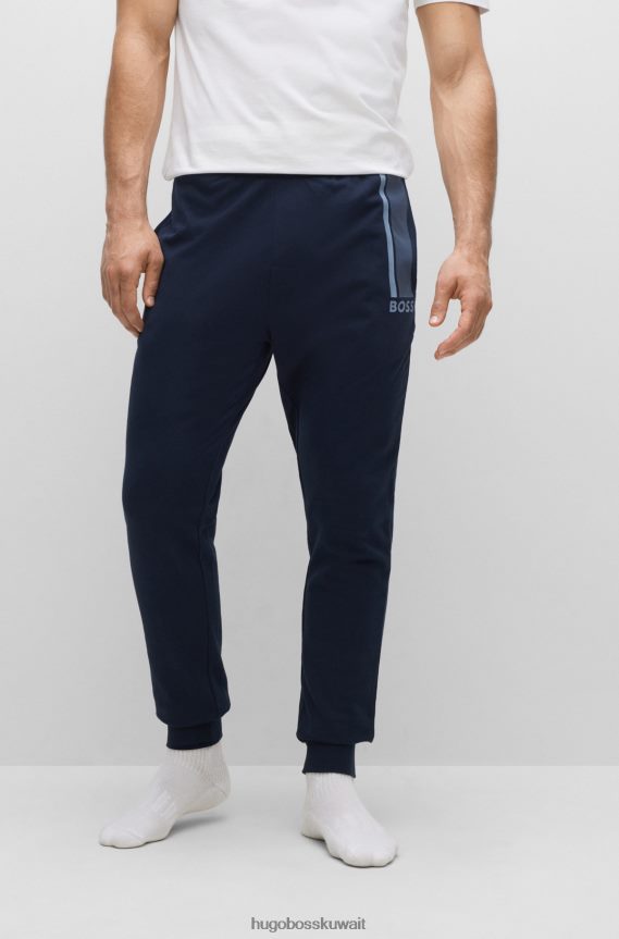 4TFNJN2672 أزرق غامق Hugo Boss بدلة رياضية من هوغو مصنوعة من قطن تيري مع شعار وخطوط باللون الأزرق الداكن