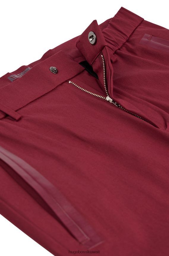 4TFNJN2757 وردي غامق Hugo Boss بنطلون هوغو ذو قصة ضيقة باللون الوردي الداكن مصنوع من مزيج القطن