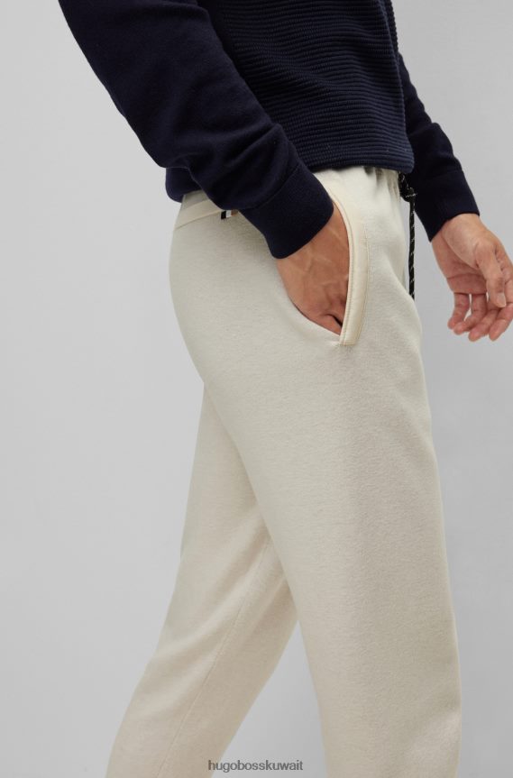 4TFNJN2868 أبيض Hugo Boss هوغو سروال رياضي أبيض بقصة عادية مصنوع من القطن والصوف البكر