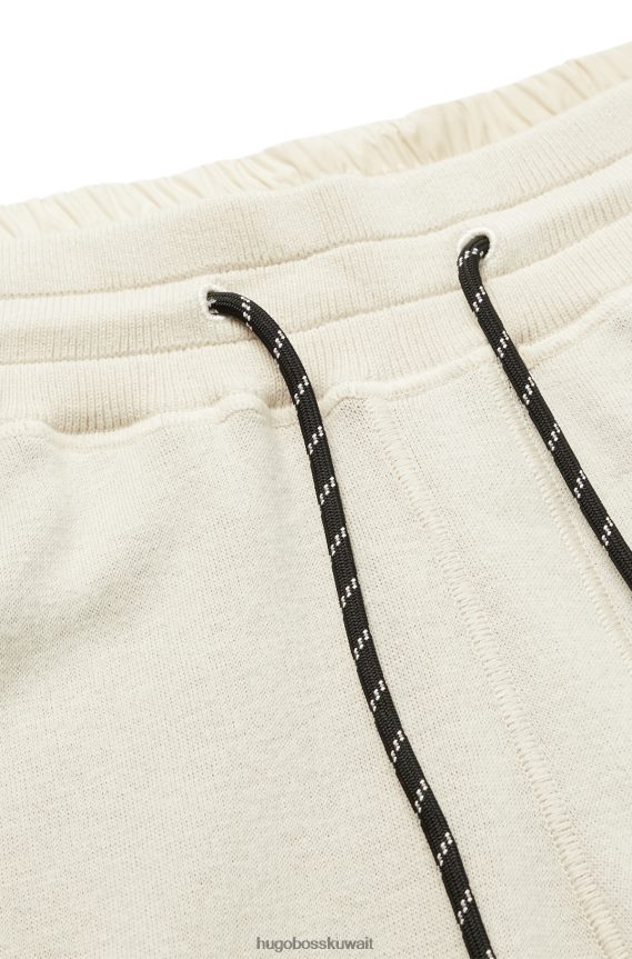 4TFNJN2868 أبيض Hugo Boss هوغو سروال رياضي أبيض بقصة عادية مصنوع من القطن والصوف البكر