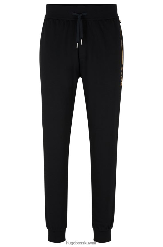 4TFNJN2892 أسود Hugo Boss بدلة رياضية من مزيج القطن من Hugo باللون الأسود مع شعار وشريط