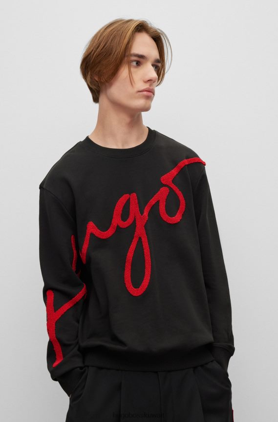 4TFNJN2920 أسود Hugo Boss سويت شيرت من قطن تيري باللون الأسود بقصة عادية مع شعار Hugo مكتوب بخط اليد