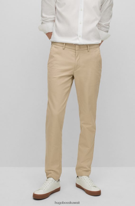 4TFNJN2946 البيج الفاتح Hugo Boss بنطال تشينو بقصة ضيقة مصنوع من قطن هوغو المطاطي باللون البيج الفاتح