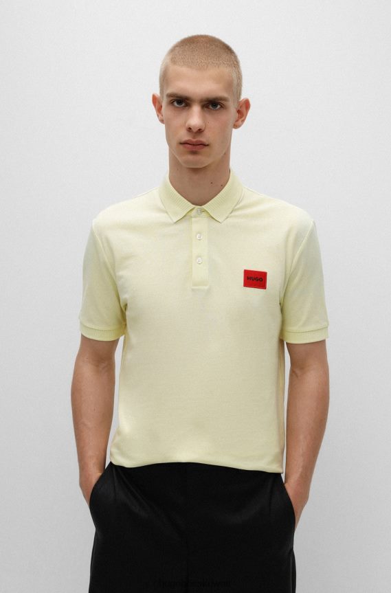 4TFNJN3110 أصفر فاتح Hugo Boss قميص بولو من Hugo مصنوع من قطن بيكيه© ذو قصة ضيقة باللون الأصفر مع ملصق شعار أحمر
