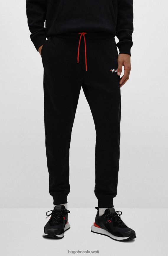 4TFNJN3209 أسود Hugo Boss بدلة رياضية من مزيج القطن باللون الأسود من Hugo مع شريط وشعار