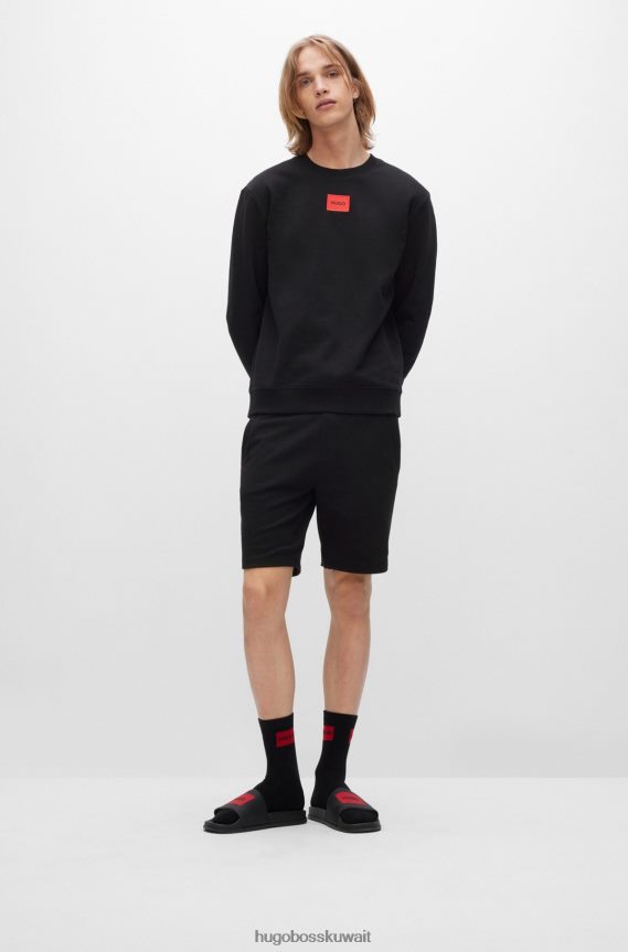 4TFNJN3244 أسود Hugo Boss سويت شيرت من قطن تيري باللون الأسود مع شعار هوغو باللون الأحمر