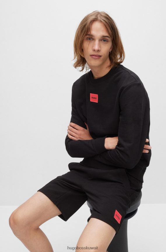 4TFNJN3244 أسود Hugo Boss سويت شيرت من قطن تيري باللون الأسود مع شعار هوغو باللون الأحمر