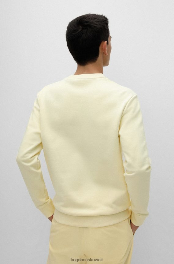 4TFNJN3245 أصفر فاتح Hugo Boss سويت شيرت من قطن تيري مع شعار أحمر هوغو أصفر فاتح