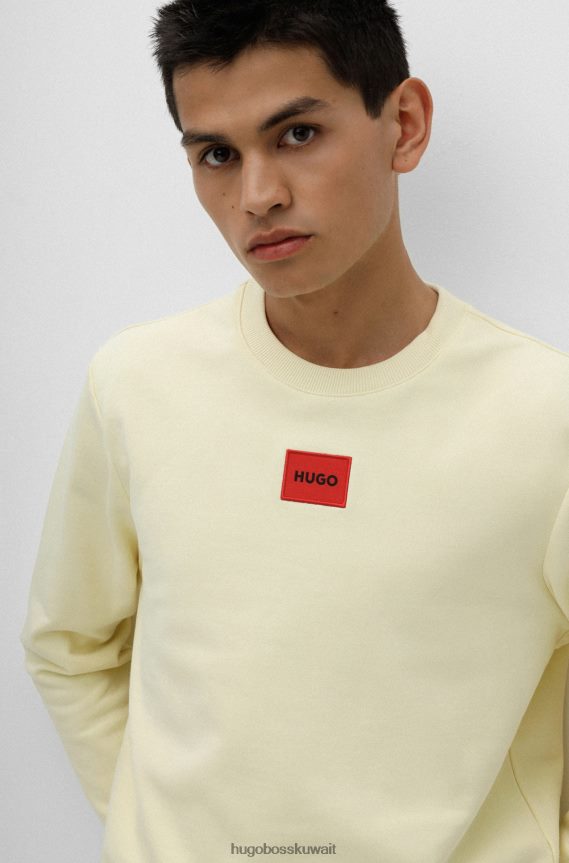 4TFNJN3245 أصفر فاتح Hugo Boss سويت شيرت من قطن تيري مع شعار أحمر هوغو أصفر فاتح