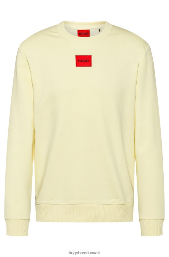 4TFNJN3245 أصفر فاتح Hugo Boss سويت شيرت من قطن تيري مع شعار أحمر هوغو أصفر فاتح