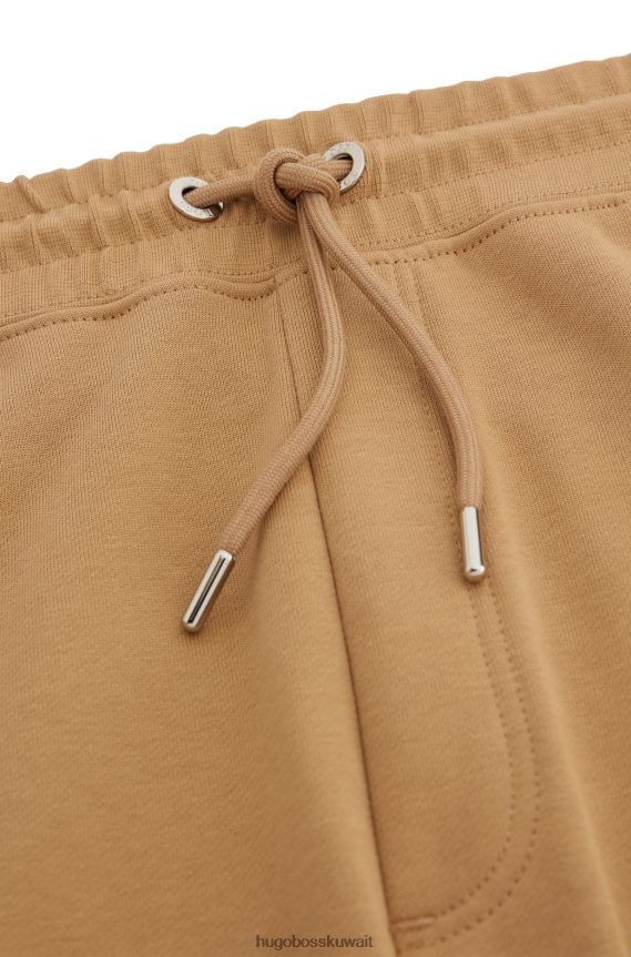 4TFNJN3316 اللون البيج Hugo Boss شورت هوغو من القطن العضوي مع رقعة Union Jack باللون البيج