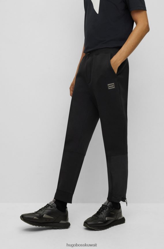 4TFNJN3338 أسود Hugo Boss قطعة سفلية رياضية من مزيج القطن مع شعار هوغو أسود مؤطر