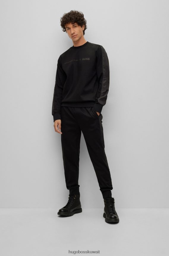 4TFNJN3355 أسود Hugo Boss قطعة سفلية من بدلة رياضية من القطن المرسيري مع أساور تحمل الشعار