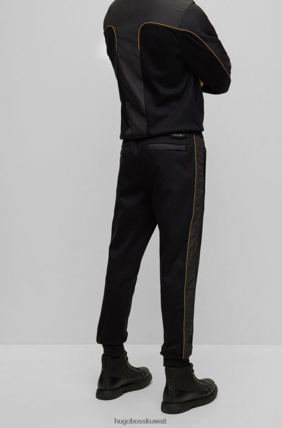 4TFNJN3355 أسود Hugo Boss قطعة سفلية من بدلة رياضية من القطن المرسيري مع أساور تحمل الشعار