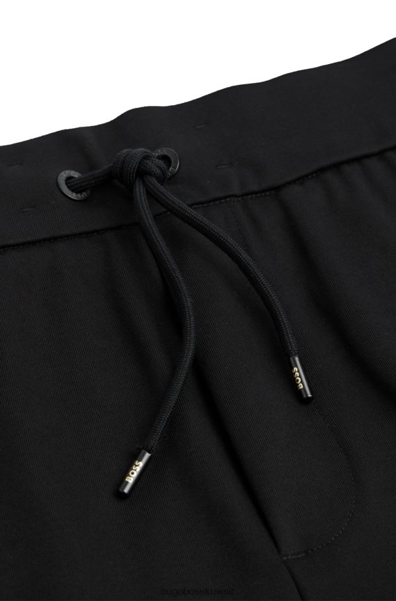 4TFNJN3355 أسود Hugo Boss قطعة سفلية من بدلة رياضية من القطن المرسيري مع أساور تحمل الشعار