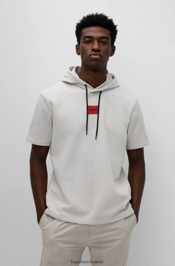 4TFNJN3360 البيج الفاتح Hugo Boss سويت شيرت هوغو من قطن تيري بأكمام قصيرة مع شعار أحمر وبيج فاتح