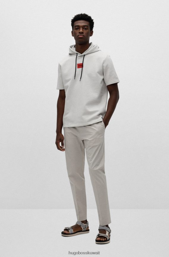 4TFNJN3360 البيج الفاتح Hugo Boss سويت شيرت هوغو من قطن تيري بأكمام قصيرة مع شعار أحمر وبيج فاتح