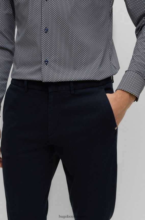 4TFNJN3404 أزرق غامق Hugo Boss بنطال تشينو Hugo ذو قصة ضيقة مصنوع من مزيج القطن المطاطي باللون الأزرق الداكن