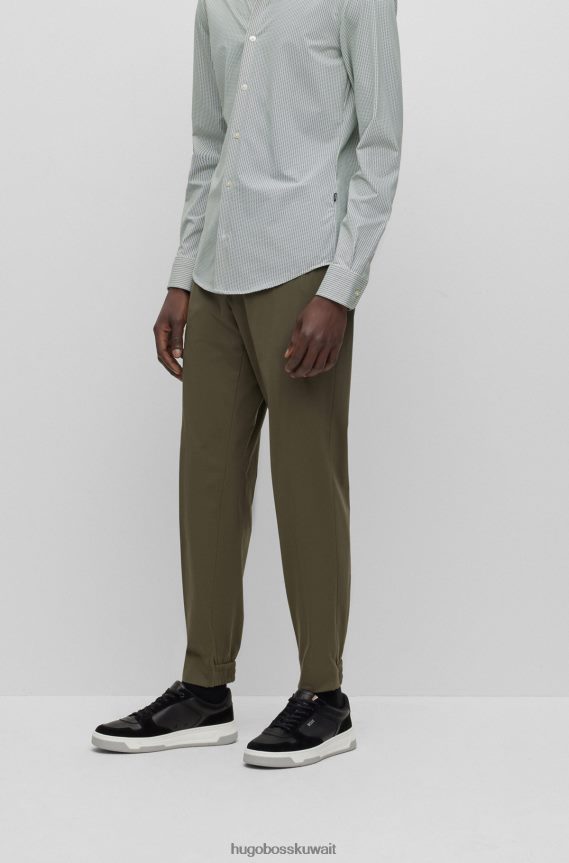 4TFNJN3434 أخضر غامق Hugo Boss بنطال هوغو ذو قصة ضيقة باللون الأخضر الداكن مصنوع من الجيرسيه المطاطي عالي الأداء