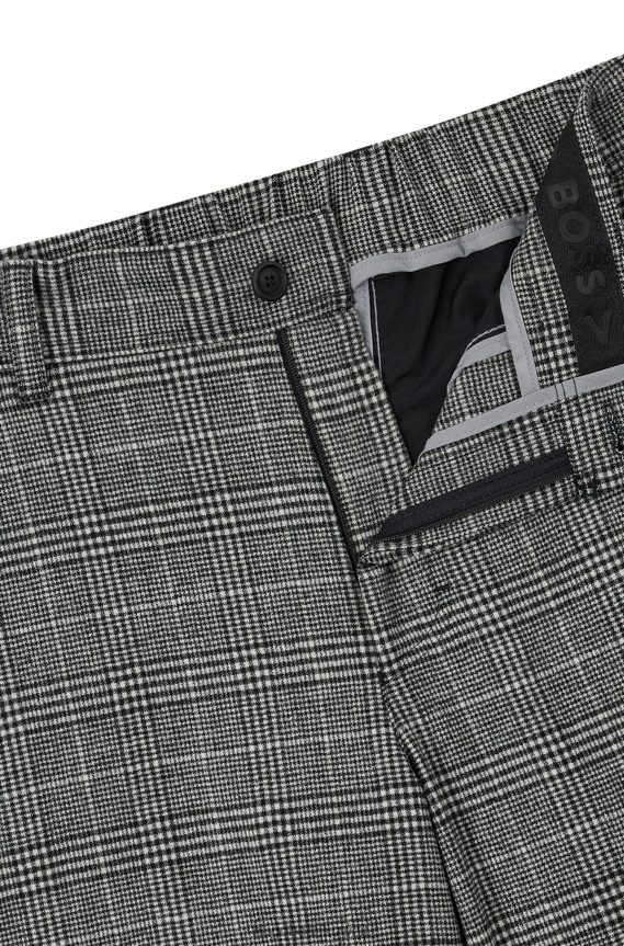 4TFNJN3520 أسود Hugo Boss بنطال بقصّة مدببة مصنوع من قماش هوغو المطاطي عالي الأداء باللون الأسود