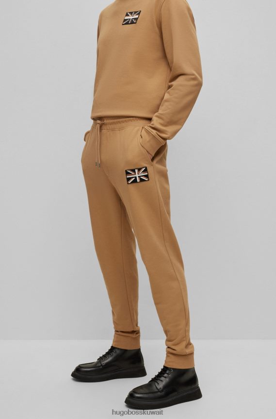 4TFNJN3534 اللون البيج Hugo Boss سروال رياضي من القطن العضوي مع رقعة Union Jack Hugo باللون البيج