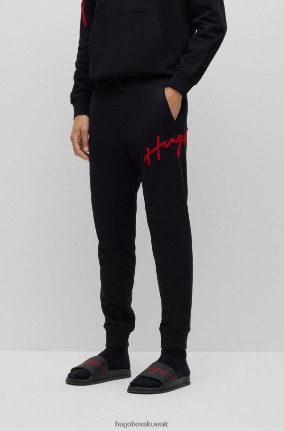 4TFNJN3550 أسود Hugo Boss بدلة رياضية من قطن تيري مع شعار مكتوب بخط اليد مطرز باللون الأسود