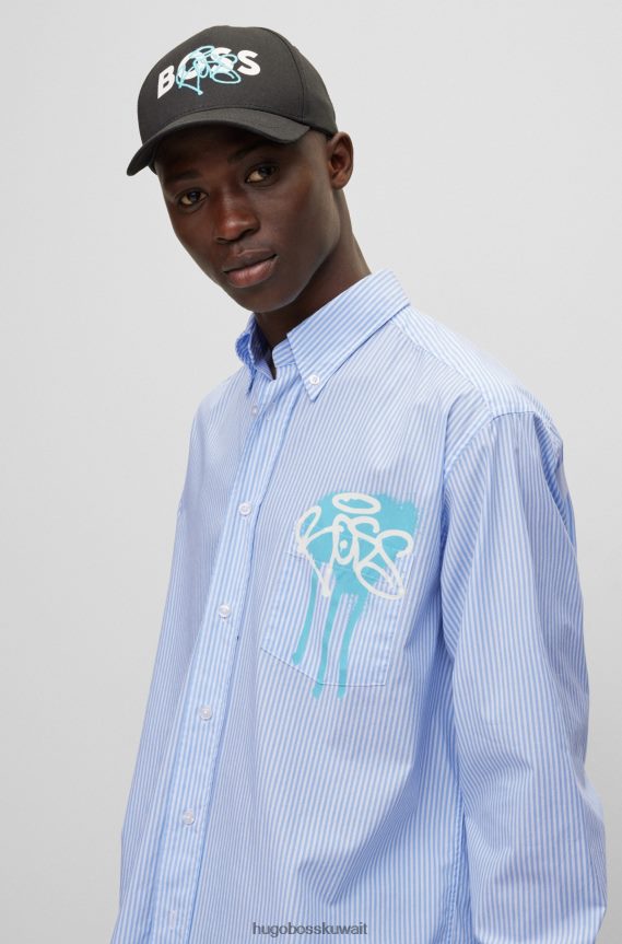 4TFNJN3578 أزرق فاتح Hugo Boss قميص أزرق فاتح بأكمام طويلة وقصة مريحة مع أعمال فنية جرافيتي هوغو