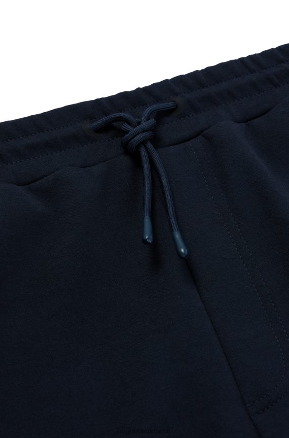 4TFNJN3579 أزرق غامق Hugo Boss قيعان رياضية مريحة مع إدراج شعار منقوش هوغو باللون الأزرق الداكن