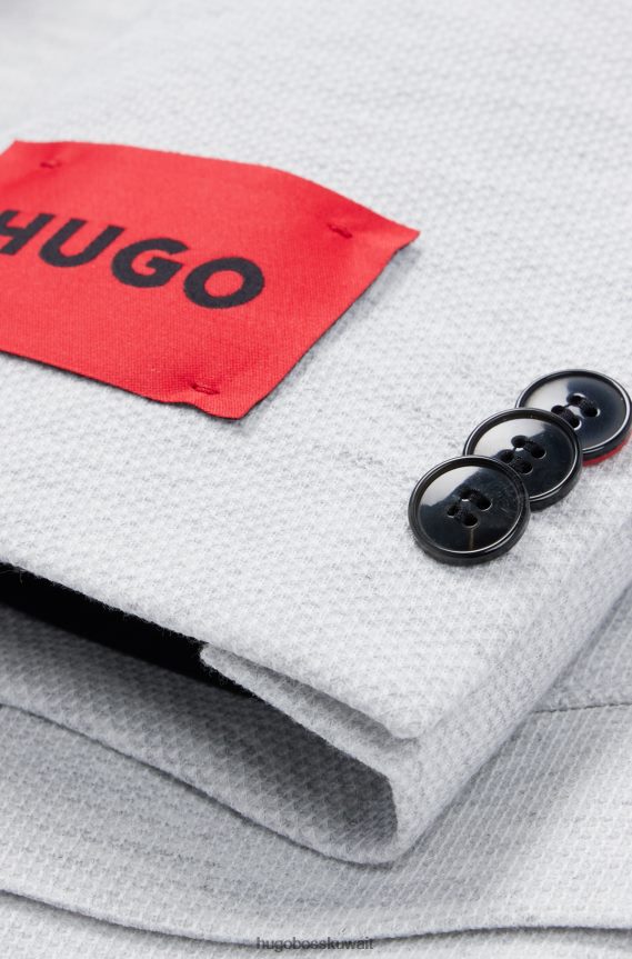 4TFNJN3682 رمادي فاتح Hugo Boss بدلة Hugo فائقة النحافة مكونة من ثلاث قطع مصنوعة من قماش ميلانج باللون الرمادي الفاتح