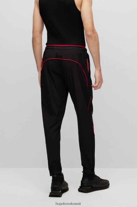 4TFNJN3732 أسود Hugo Boss قطعة سفلية رياضية من Hugo باللون الأسود بقصة عادية مع شعار الأنابيب والكبسولة