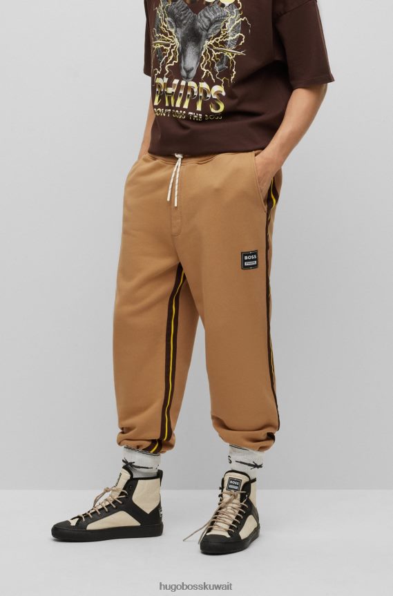 4TFNJN3780 اللون البيج Hugo Boss بنطال رياضي طويل من القطن العضوي x phipps