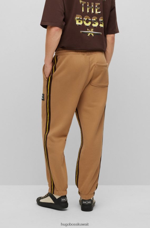 4TFNJN3780 اللون البيج Hugo Boss بنطال رياضي طويل من القطن العضوي x phipps