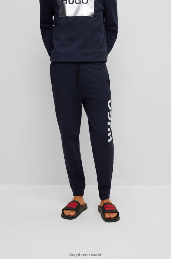 4TFNJN3812 أزرق غامق Hugo Boss هوغو سروال رياضي برباط باللون الأزرق الداكن من قماش تيري الفرنسي مع شعار كبير