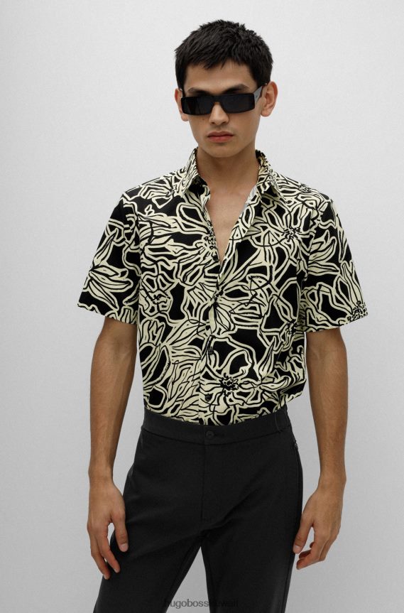 4TFNJN3860 أصفر فاتح Hugo Boss قميص بقصّة مريحة مصنوع من قماش القطن المطبوع بطبعة أوراق الشجر باللون الأصفر الفاتح
