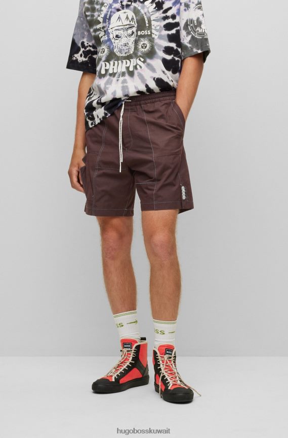 4TFNJN3879 وردي غامق Hugo Boss شورت Hugo x phipps القطني مصنوع من بقايا الملابس المُعاد تصنيعها