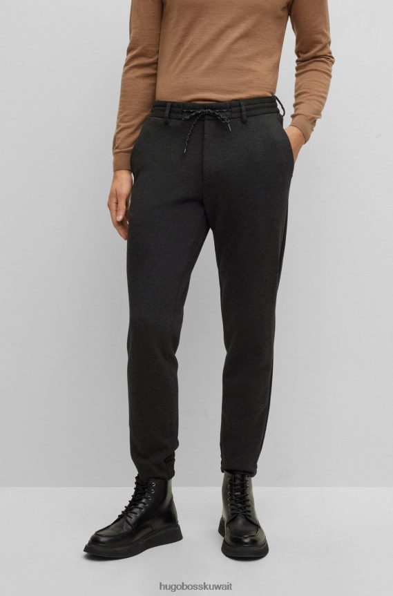 4TFNJN3935 الرمادي الداكن Hugo Boss بنطلون هوغو برباط باللون الرمادي الداكن مصنوع من الجيرسيه المطاطي عالي الأداء