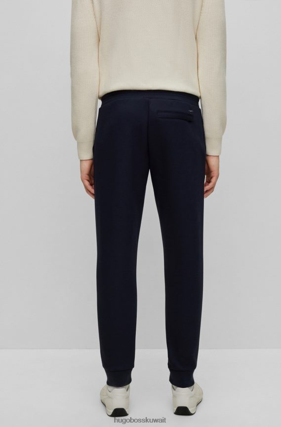 4TFNJN3950 أزرق غامق Hugo Boss قيعان رياضية بأساور من مزيج القطن مع حرير هوغو باللون الأزرق الداكن