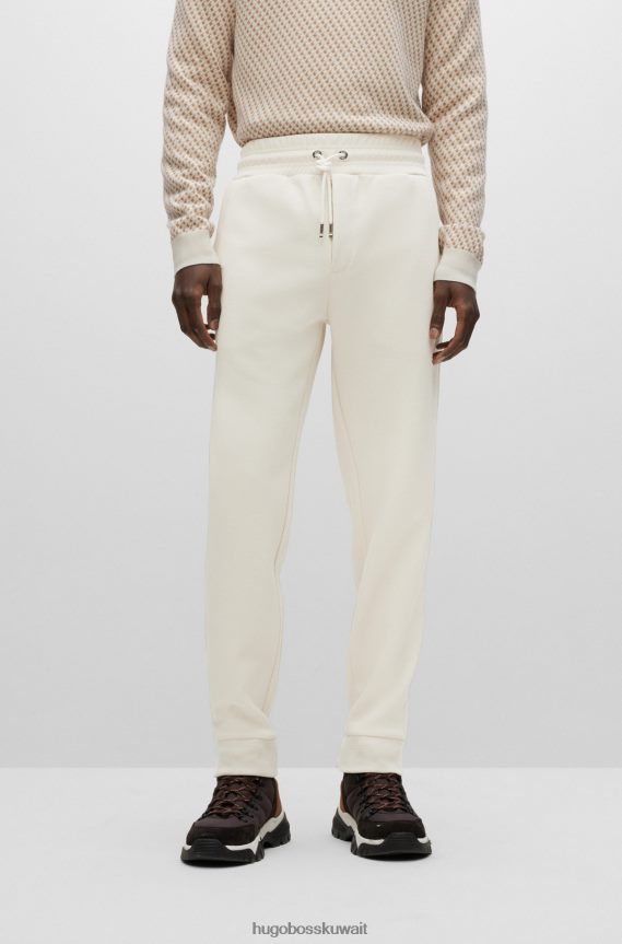 4TFNJN3951 أبيض Hugo Boss بدلة رياضية بيضاء بأساور من مزيج القطن مع حرير هوغو