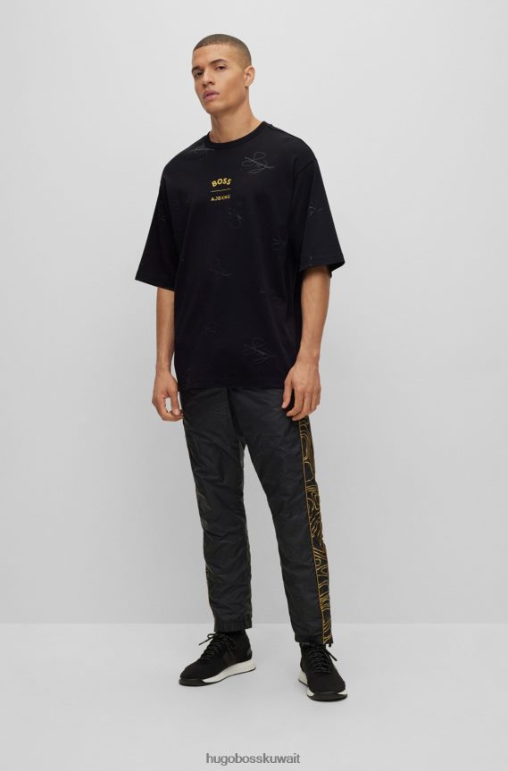 4TFNJN3998 أسود Hugo Boss تي شيرت x ajbxng من القطن المتشابك مع علامة تجارية وتوقيعات تعاونية