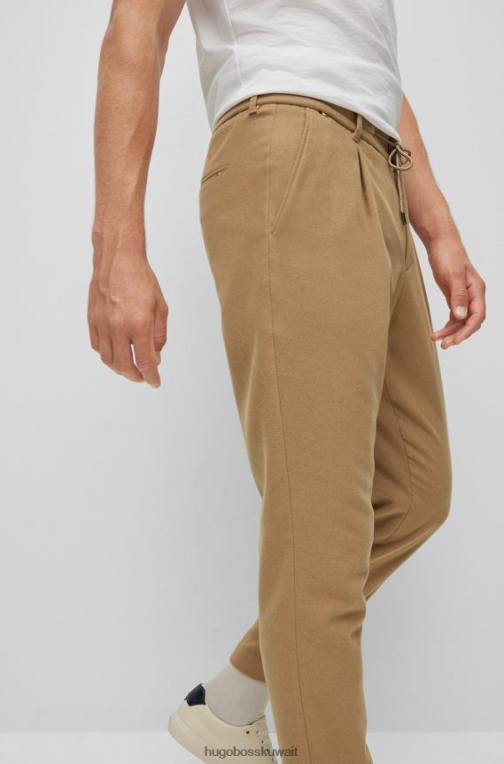 4TFNJN4012 اللون البيج Hugo Boss بنطال Hugo باللون البيج مع ثنيات أمامية
