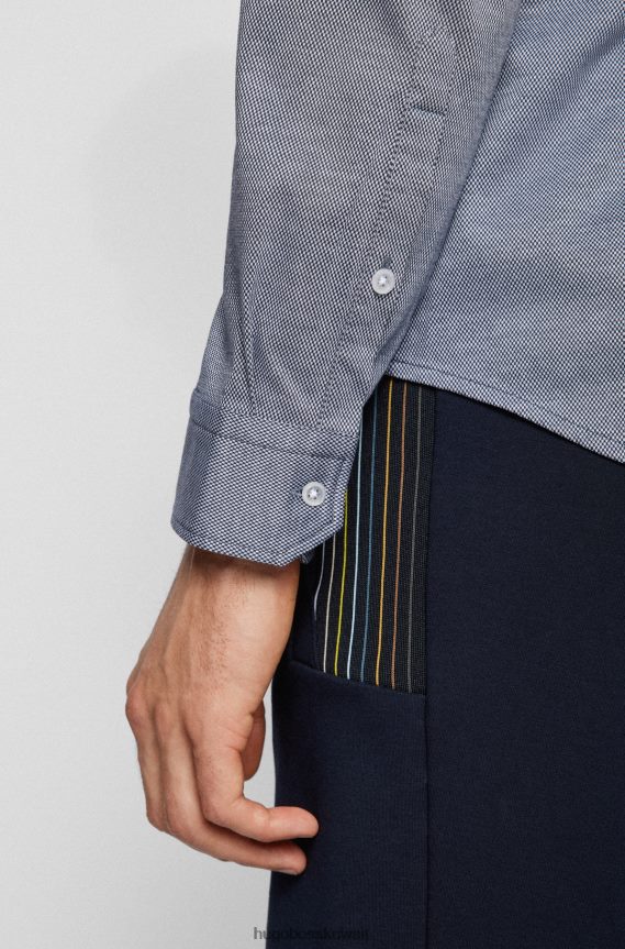 4TFNJN4081 أزرق Hugo Boss قميص جيرسي أزرق بقصة عادية مع ياقة هوغو بأزرار سفلية