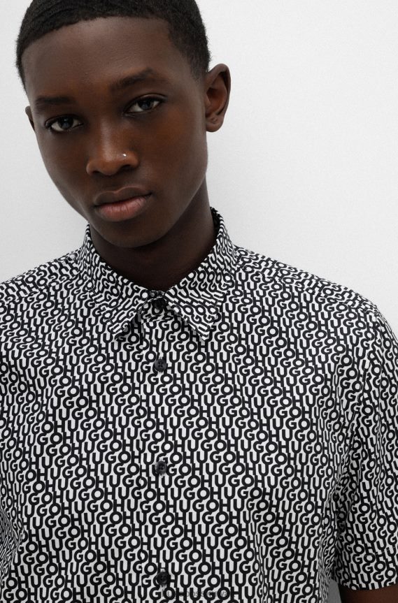 4TFNJN4096 أزرق غامق Hugo Boss قميص Hugo باللون الأزرق الداكن المريح مصنوع من القطن بطبعة الشعار وملمس الورق