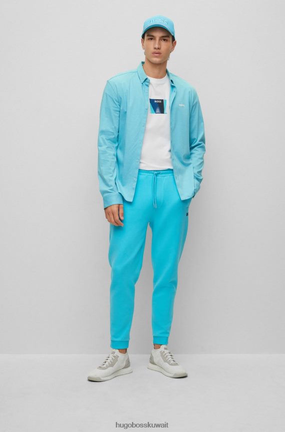 4TFNJN4116 أبيض Hugo Boss تي شيرت مريح مصنوع من القطن المطاطي مع عمل فني مطبوع باللون الأبيض